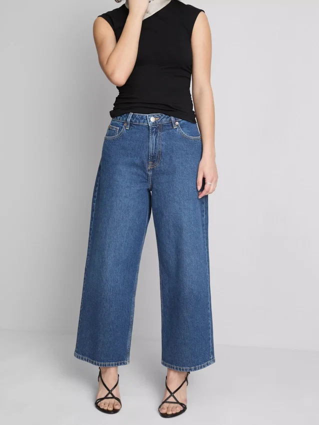 Korte jeans i denim med vide ben