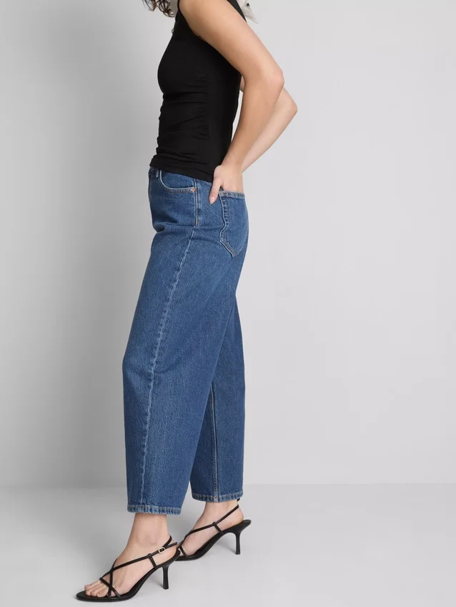 Korte jeans i denim med vide ben