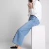 Korte jeans i denim med vide ben