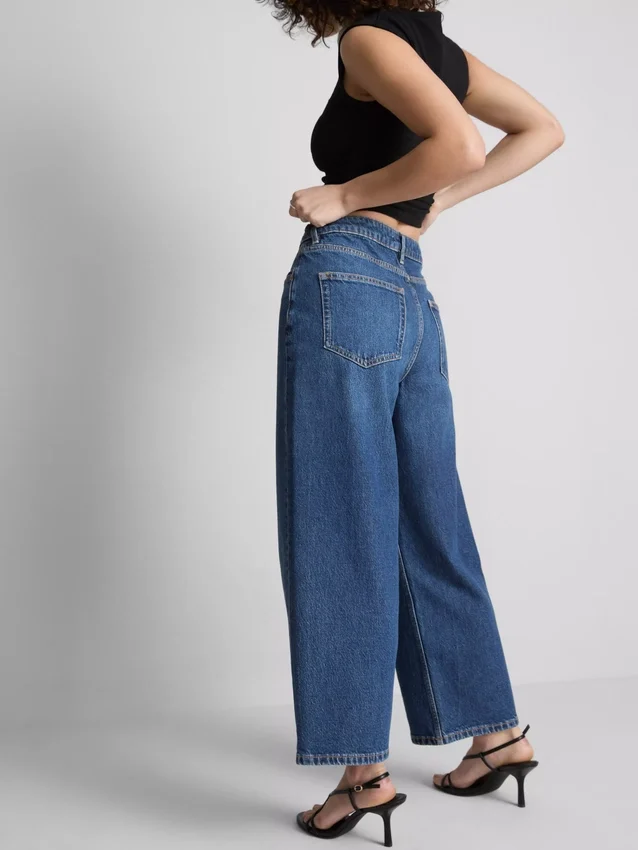 Korte jeans i denim med vide ben