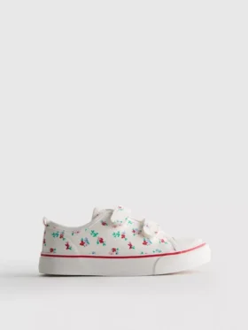 Lavt snøringssneakers i lerret med blomstermønster