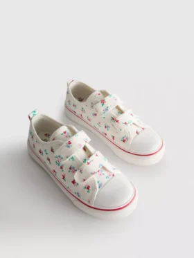 Lavt snøringssneakers i lerret med blomstermønster