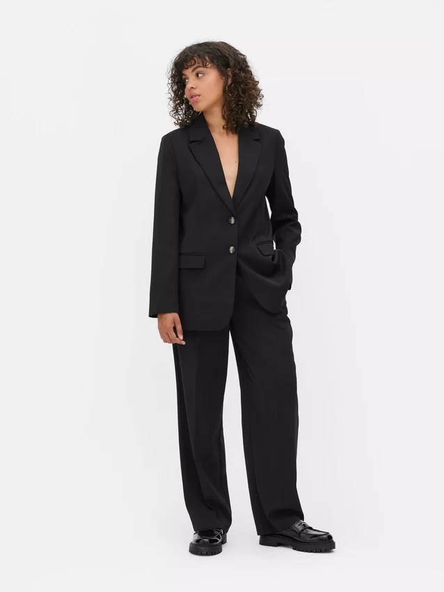 Lila blazer med én rad knapper