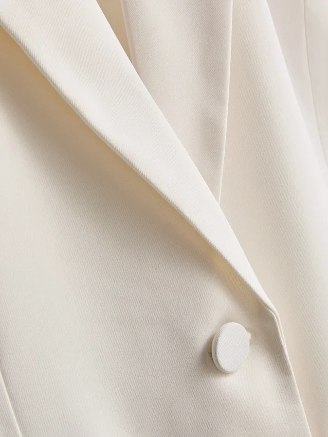 Lila blazer med én rad knapper