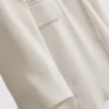 Lila blazer med én rad knapper