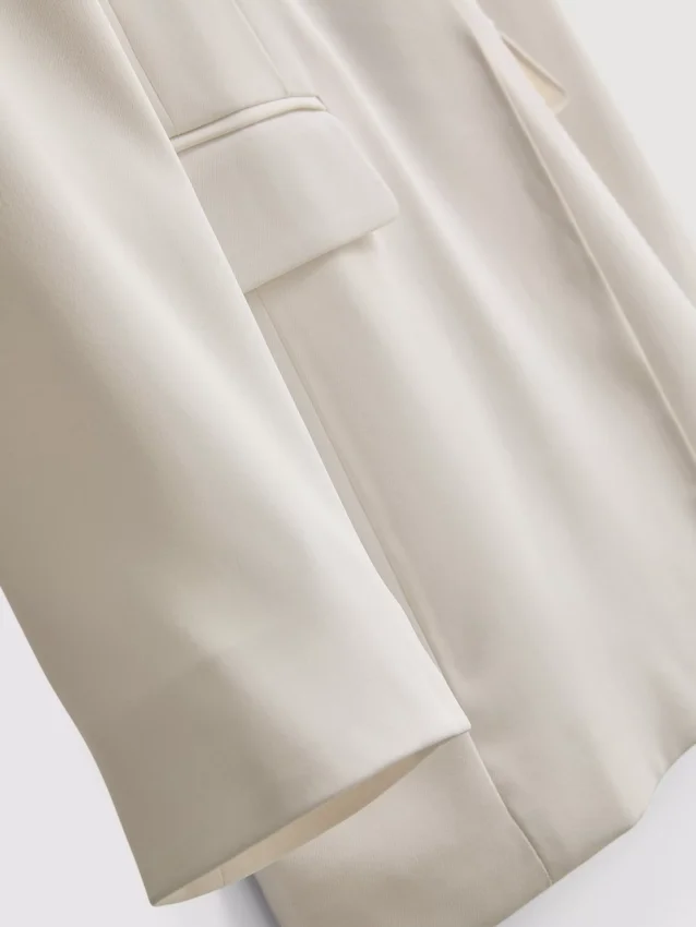 Lila blazer med én rad knapper