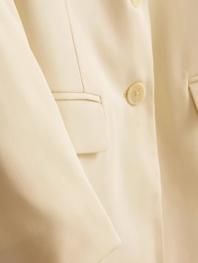 Lila blazer med én rad knapper