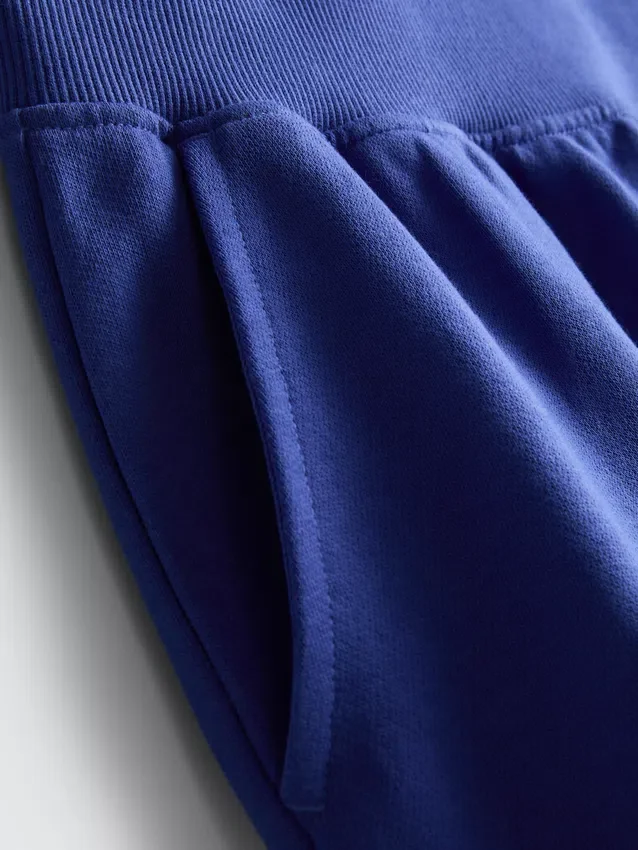 Loungeshorts i bomull med splittet kant