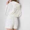 Løse shorts med blomstermønster i bomullsrikt stoff