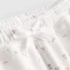 Løse shorts med blomstermønster i bomullsrikt stoff