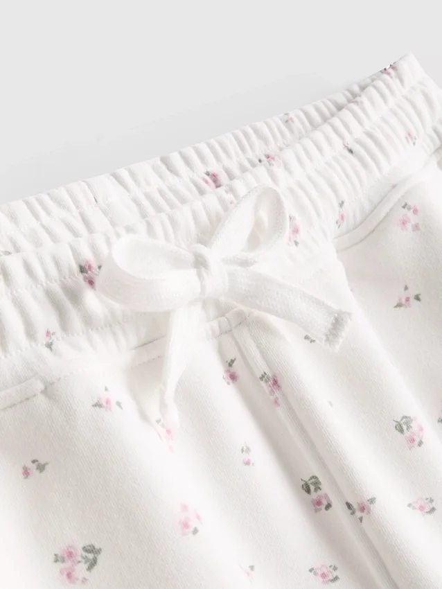 Løse shorts med blomstermønster i bomullsrikt stoff