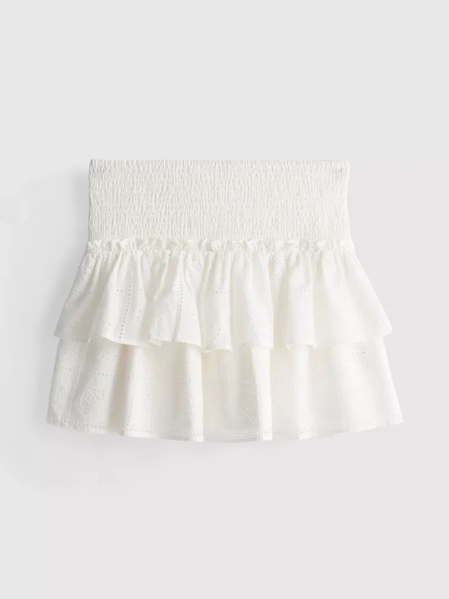Mini-skjørt i bomull med lagvis design og broderi