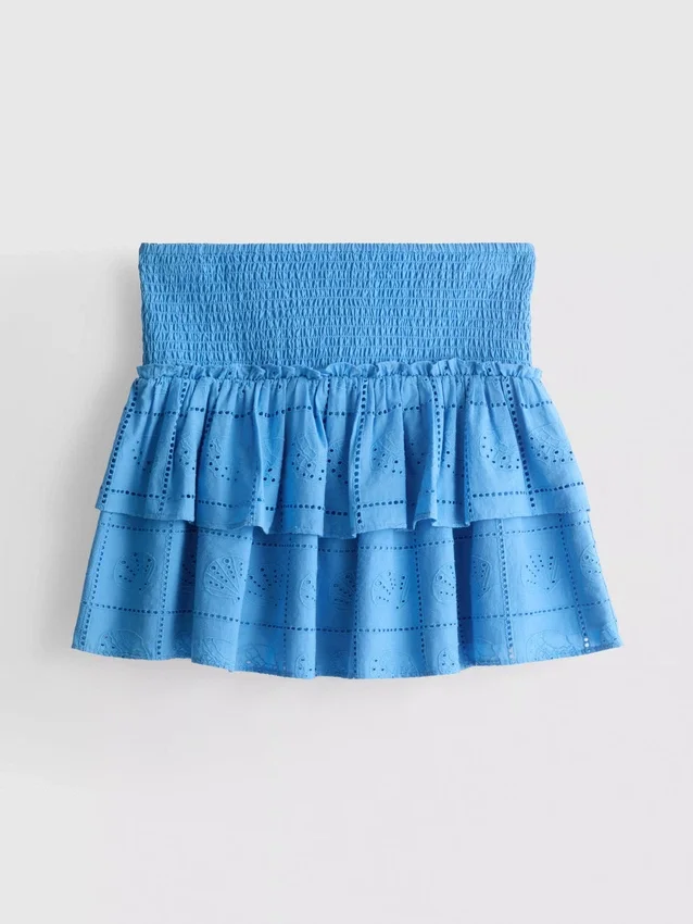 Mini-skjørt i bomull med lagvis design og broderi