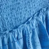 Mini-skjørt i bomull med lagvis design og broderi