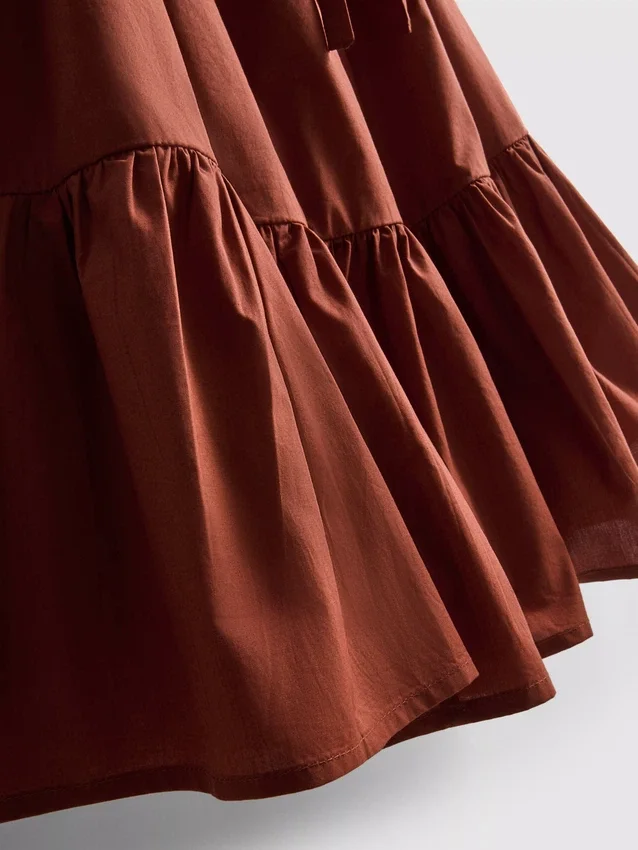 Minikjole i poplin med stropper og volanger