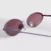 Ovale solbriller fra 90-tallet med tonede glass