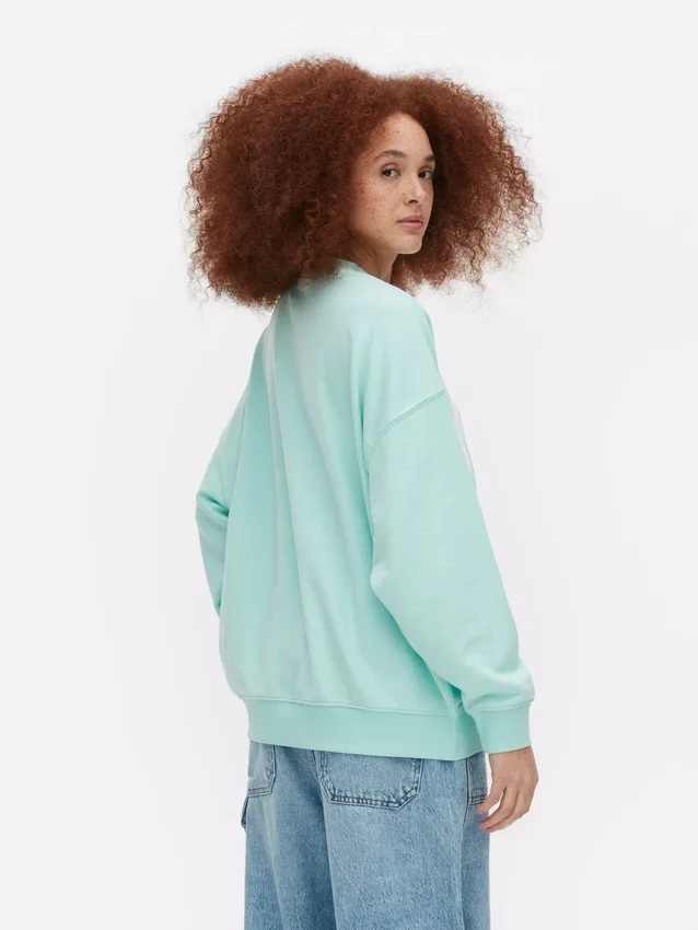 Oversized genser med «Miami»-skrift