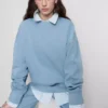 Oversized genser med nedlagte skuldre
