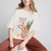 Oversized T-skjorte i bomull i gammeldags stil