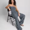 Paula Echevarría bandeau-top i gingham med volanger