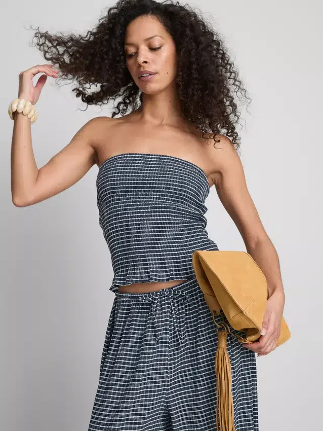 Paula Echevarría bandeau-top i gingham med volanger