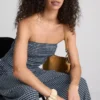 Paula Echevarría bandeau-top i gingham med volanger