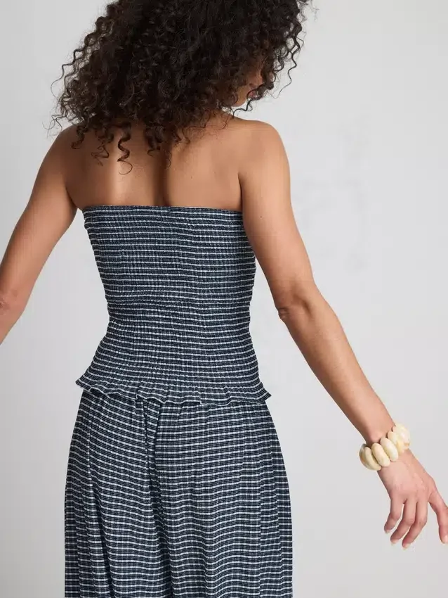 Paula Echevarría bandeau-top i gingham med volanger