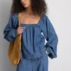 Paula Echevarría denim-top med puffermmer