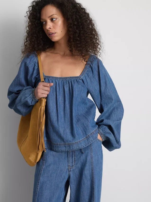 Paula Echevarría denim-top med puffermmer