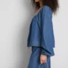 Paula Echevarría denim-top med puffermmer