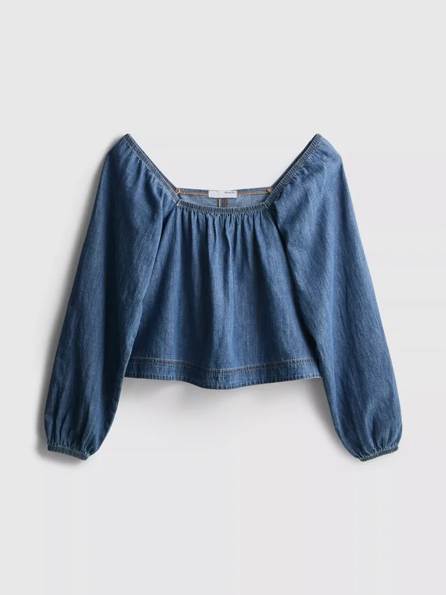 Paula Echevarría denim-top med puffermmer