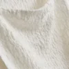 Paula Echevarría rynket, krøllet tank-top