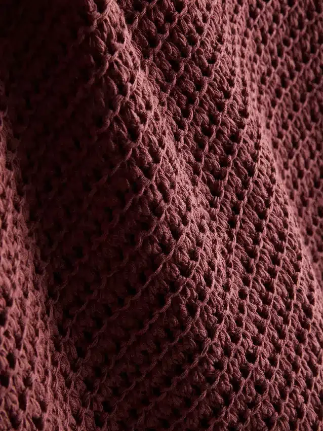 Paula Echevarría strikket asymmetrisk topp