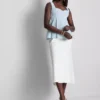 Peplum-top i krepp med hjerteformet utringning