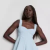 Peplum-top i krepp med hjerteformet utringning