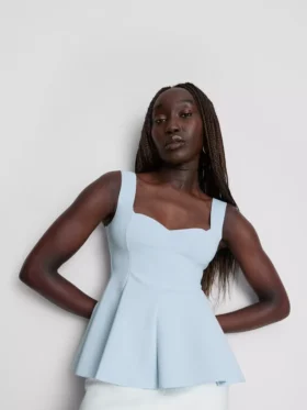 Peplum-top i krepp med hjerteformet utringning