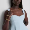 Peplum-top i krepp med hjerteformet utringning