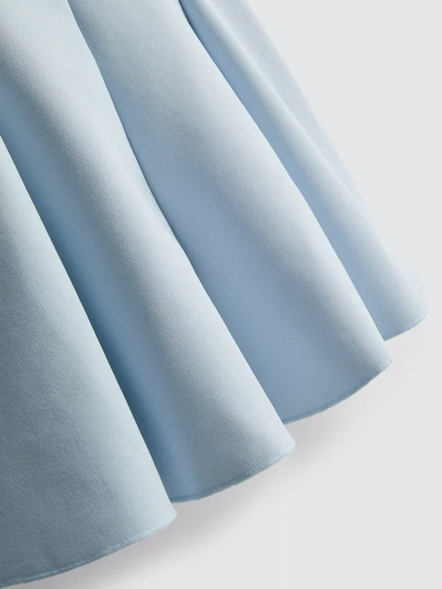 Peplum-top i krepp med hjerteformet utringning