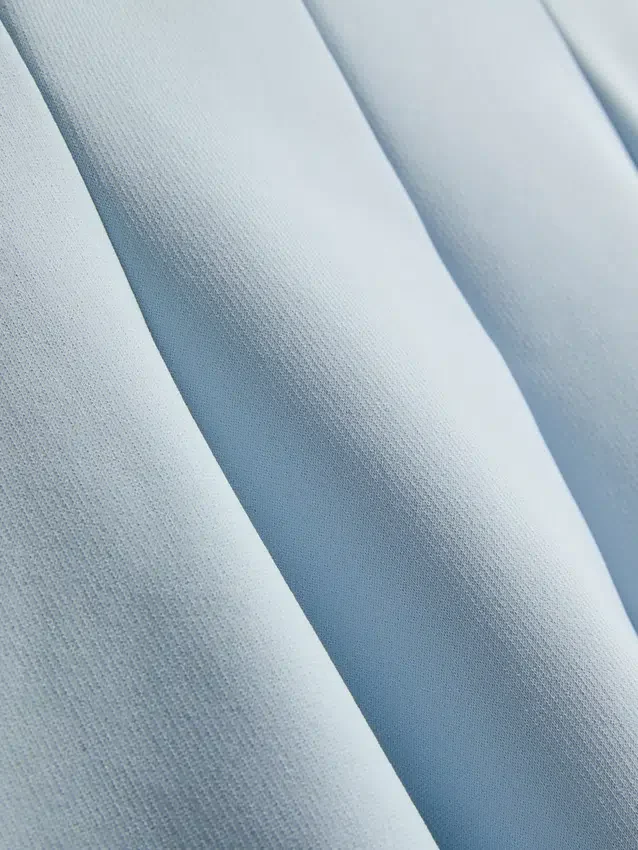 Peplum-top i krepp med hjerteformet utringning