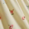 Ribbede pysjamaser med blomstertrykk