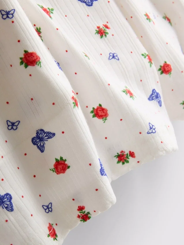 Ribbede pysjamaser med sommerfuglemotiv