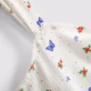 Ribbet pysjamaser-cami med sommerfuglemotiv