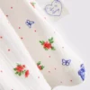 Ribbet pysjamaser-cami med sommerfuglemotiv