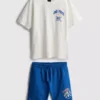Sett med T-skjorte og shorts i ett stykke