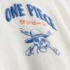 Sett med T-skjorte og shorts i ett stykke