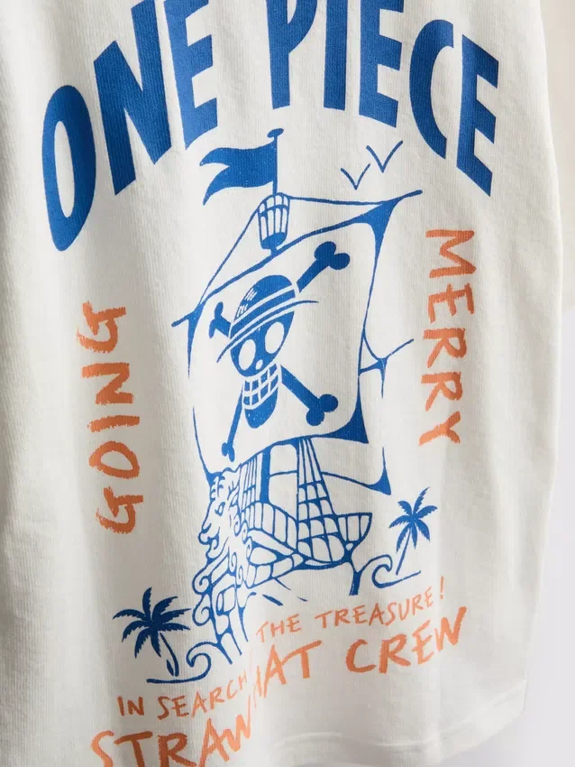 Sett med T-skjorte og shorts i ett stykke