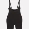 Shapewear-bodysuit med åpen brystdel og lengde til midt på låret