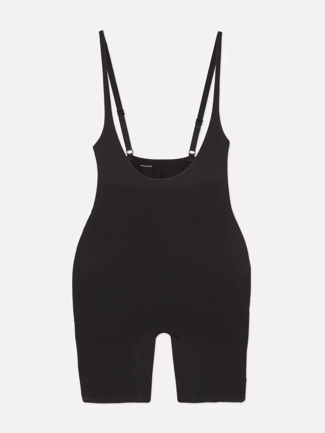 Shapewear-bodysuit med åpen brystdel og lengde til midt på låret