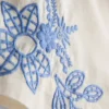 Shorts i bomull med blomsterbroderi