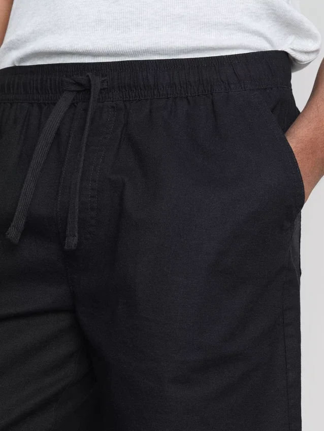 Shorts i linblanding med snøring